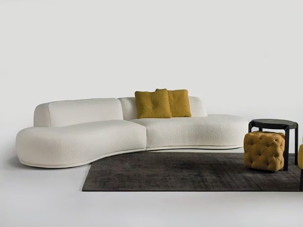 BAGUTTA Curved sectional fabric sofa